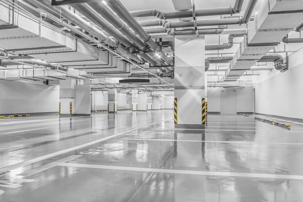 Empty space car park interior at night